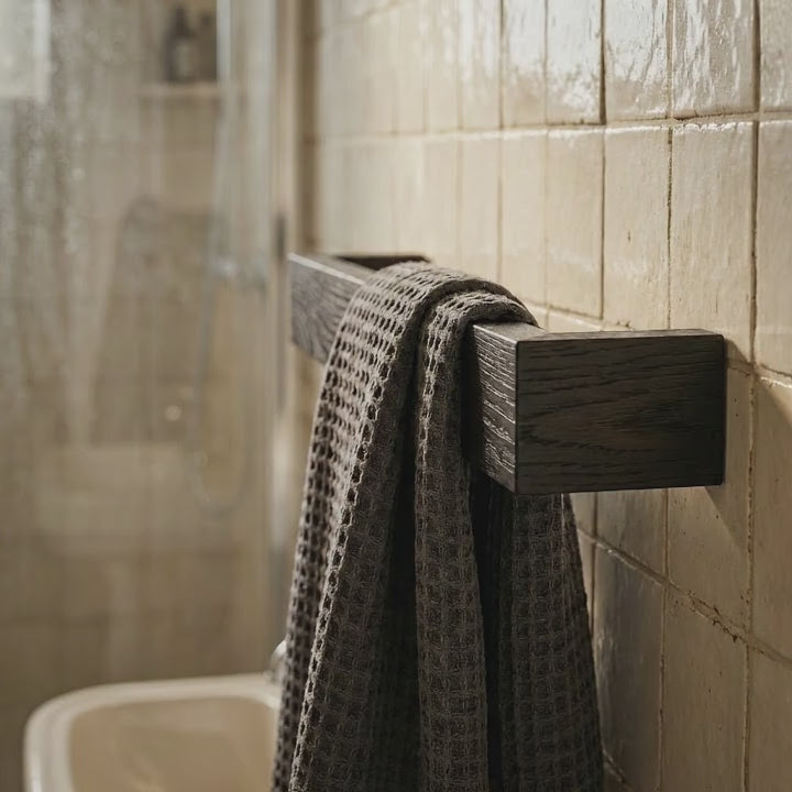 Black stained ash slimline towel rack wall mounted