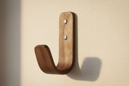 Walnut coat hook on the wall 